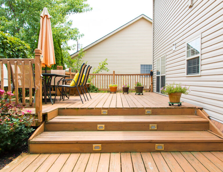 Step Up Your Space Enhancing Homes through Deck Building