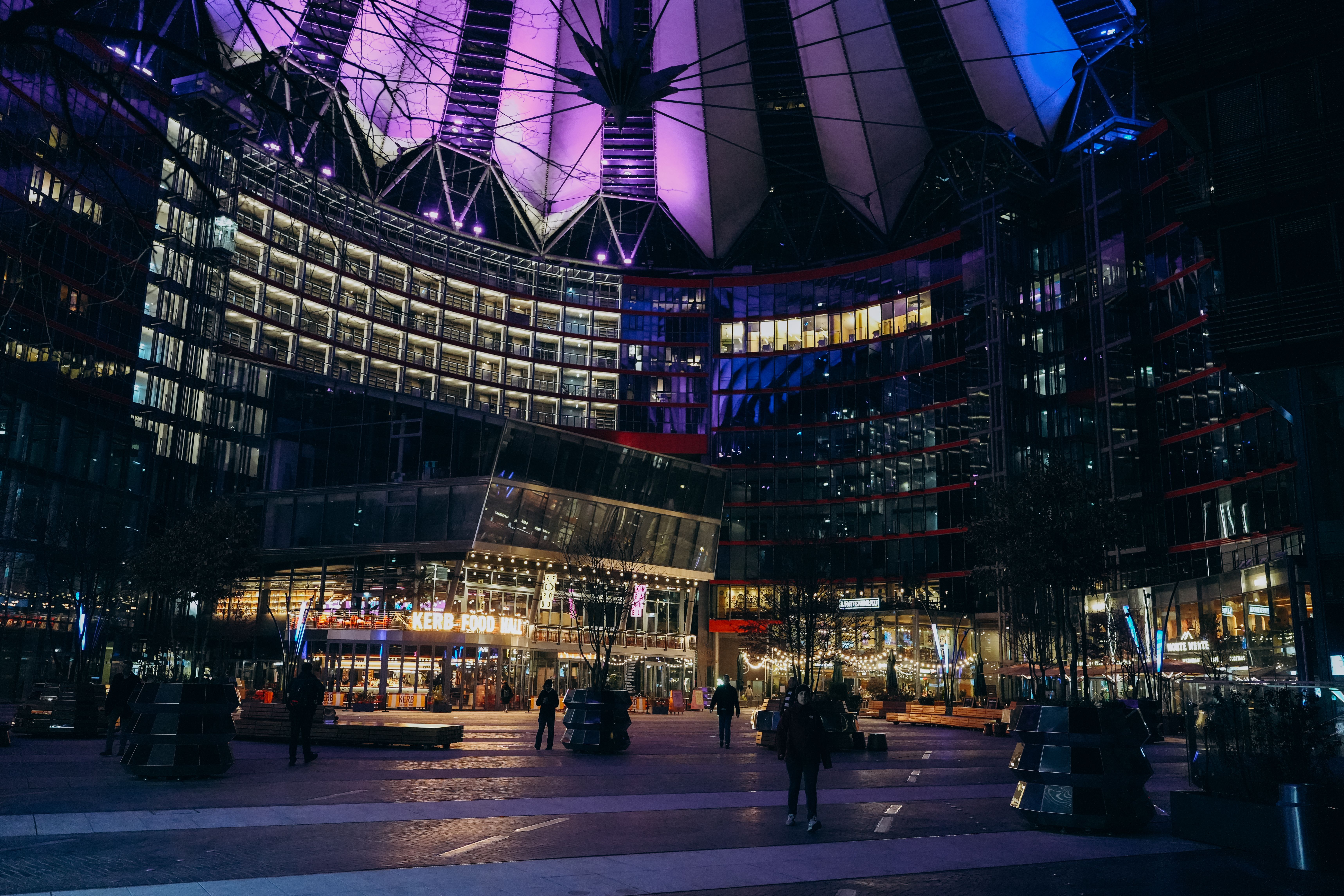 The illuminated Sony Center in Berlin at night, evoking Germany's modern media and entertainment landscape.